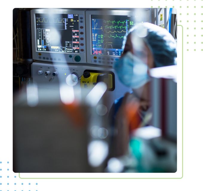 Anesthesiologist beside machines that will be used for procedure