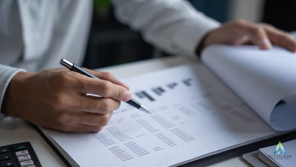 A cover image of a guidebook titled A Business Owner's Guide to Accounting featuring a professional design