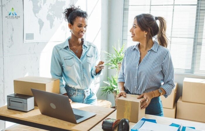 Two women are discussing a small business tax accountant.