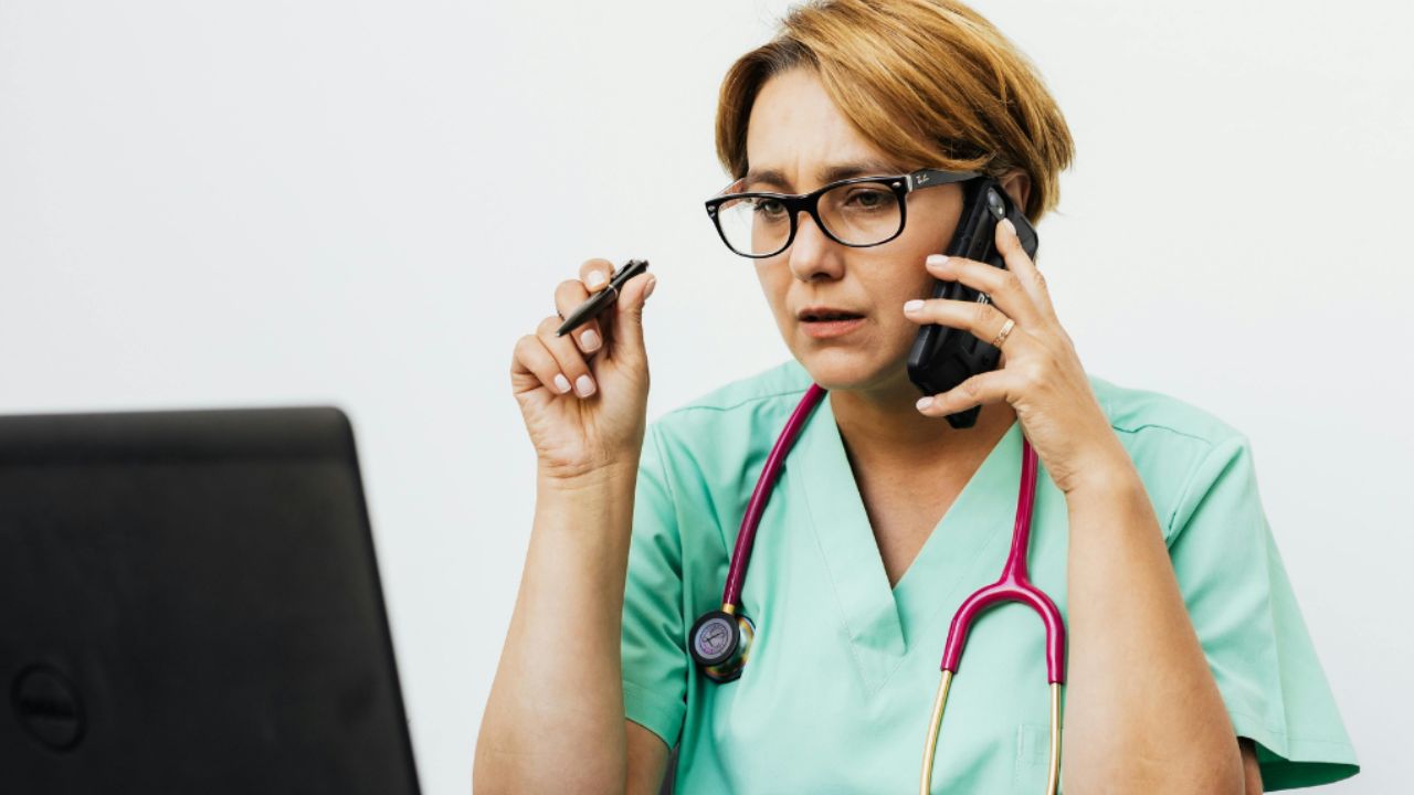 Nurse sitting in front of computer
