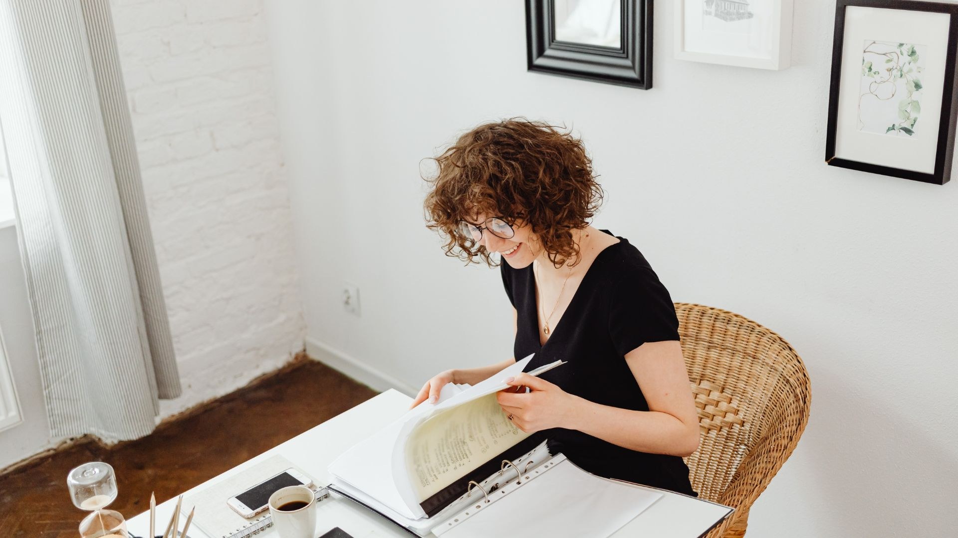 Real estate investor reviewing year-end tax planning documents at a desk